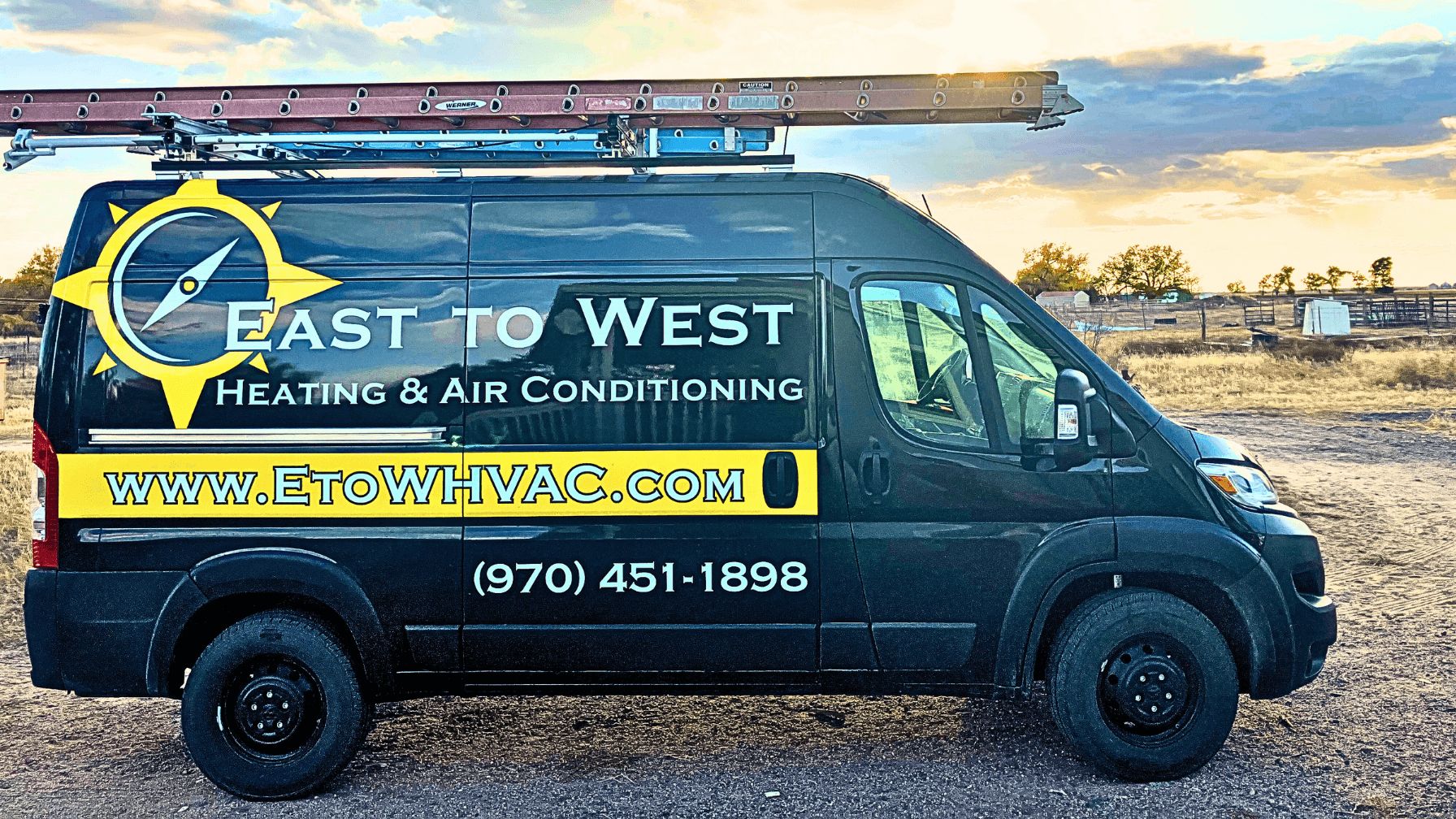 East to West HVAC service van in rural Colorado setting, showcasing our service area coverage